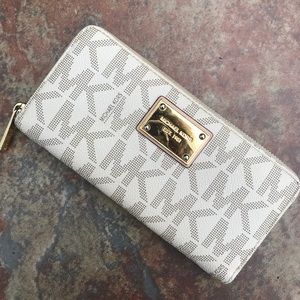 MICHAEL KORS monogram wallet - moderately used